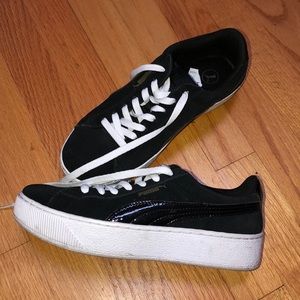 Black Puma sneakers